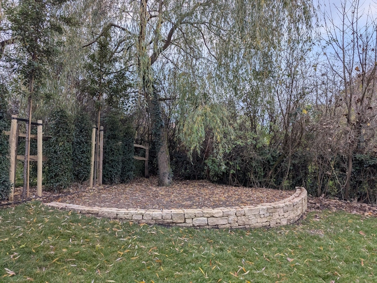 Rear borders filled with colour and texture connecting the house to the landscape