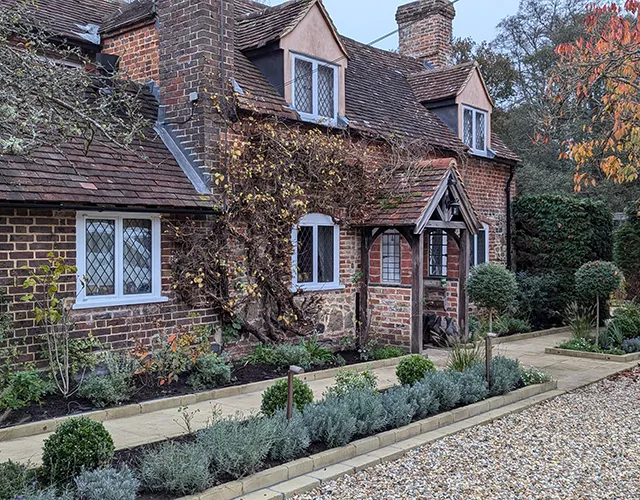 House with planting outside the front
