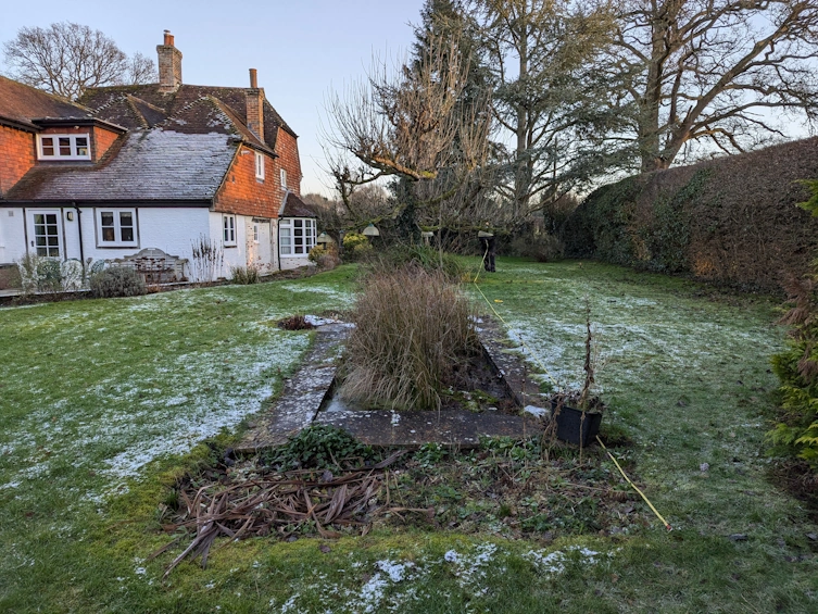 The original pond in the Farnham garden before renovation