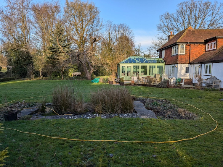 Another view of the old pond that needed extending and redesigning